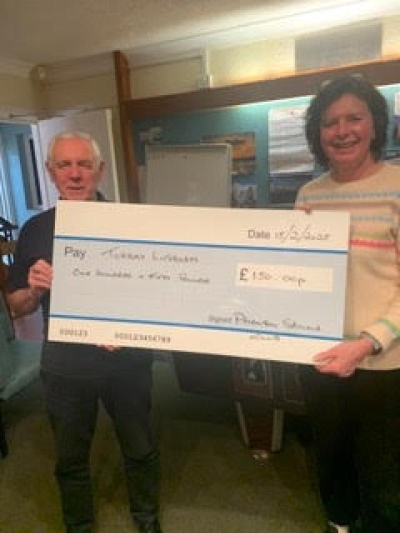 RNLI cheque presentation Peter Thorp and Morag Aiken