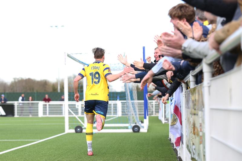 Cody Cooke celebrates with the Yellow Army. Pic from PPAUK
