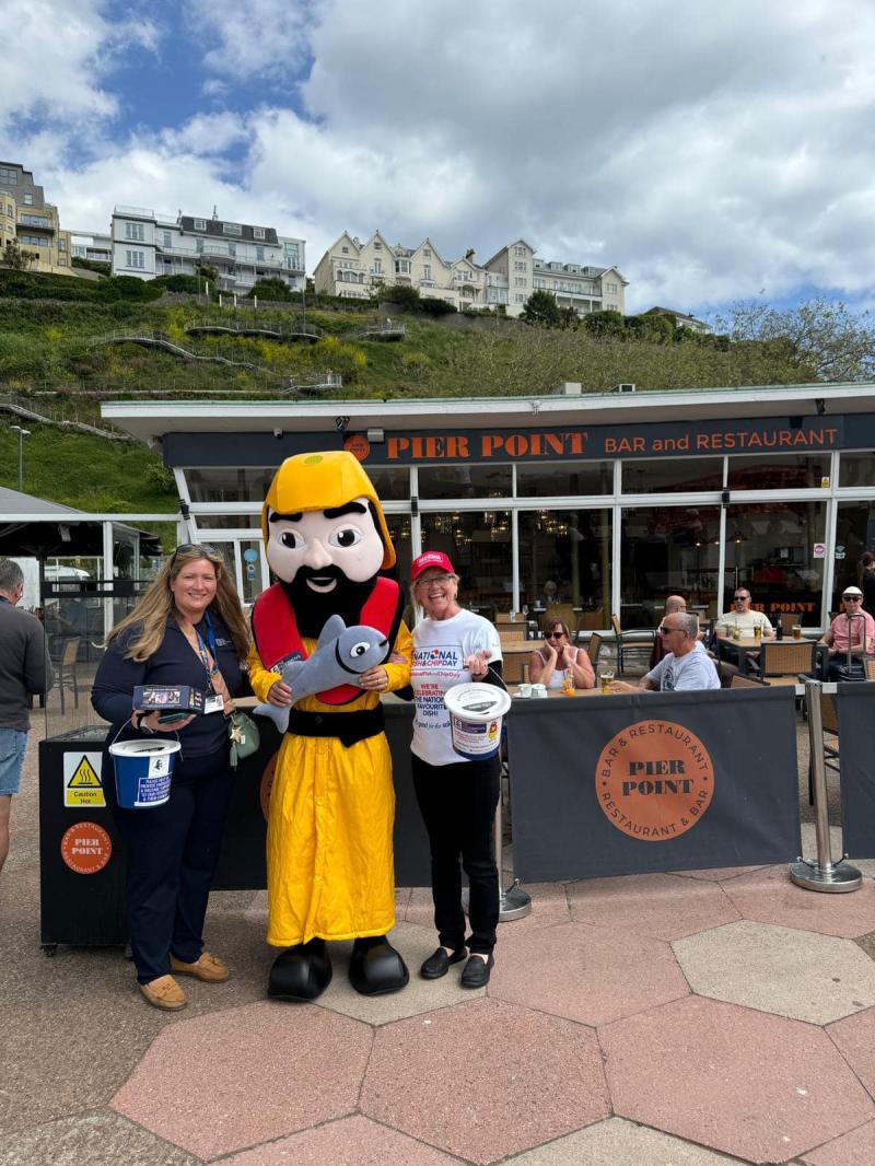 Lorraine Arnold and Fishermen's Mission Mascot Albert fund-raising outside Pier Point on National Fish and Chip Shop Day