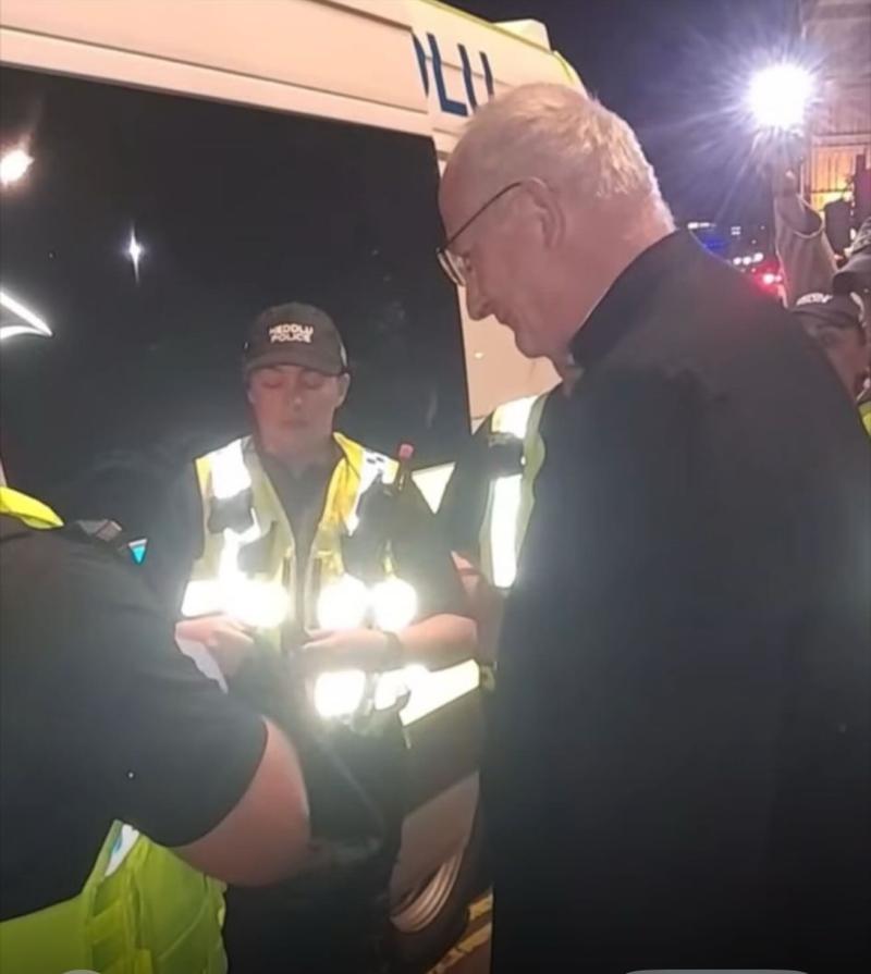 Father Jim Barlow arrested