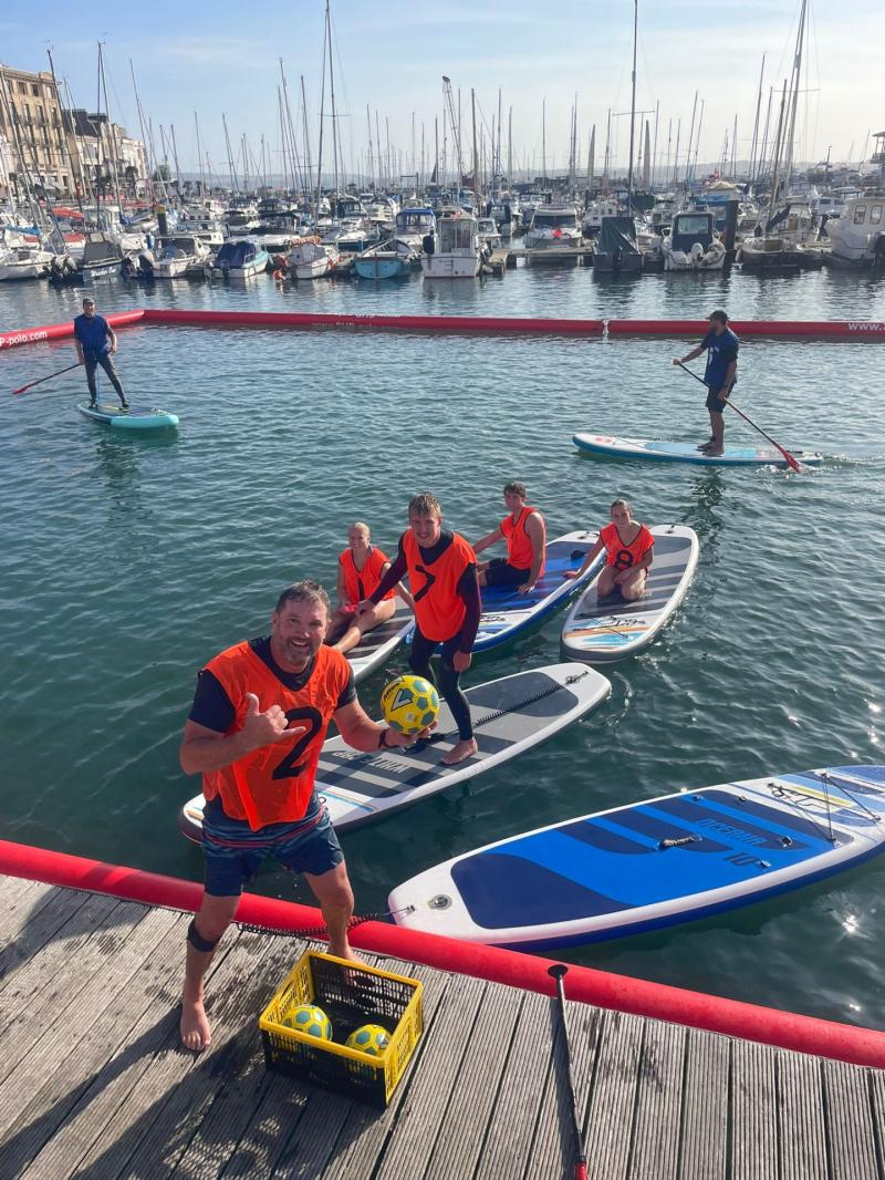 Organiser Brendon Prince and the SUP POLO  tournament winners at the SUPERFestival.