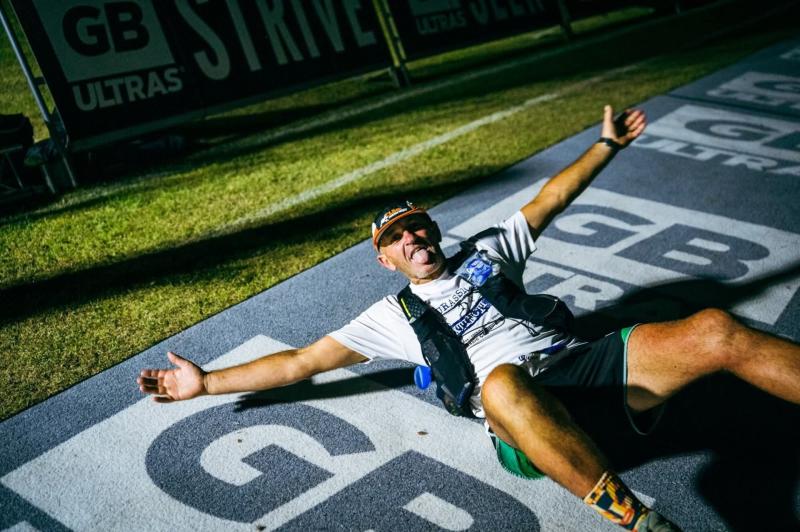 Matt Dalton celebrating at the end of the Race Across Scotland. Image courtesy Neil Shearer