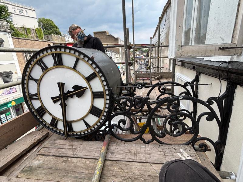 Telling time for the 150-year-old Conroy Couch clock