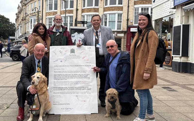 Torbay MP Steve Darling with a giant letter for the Health Minister