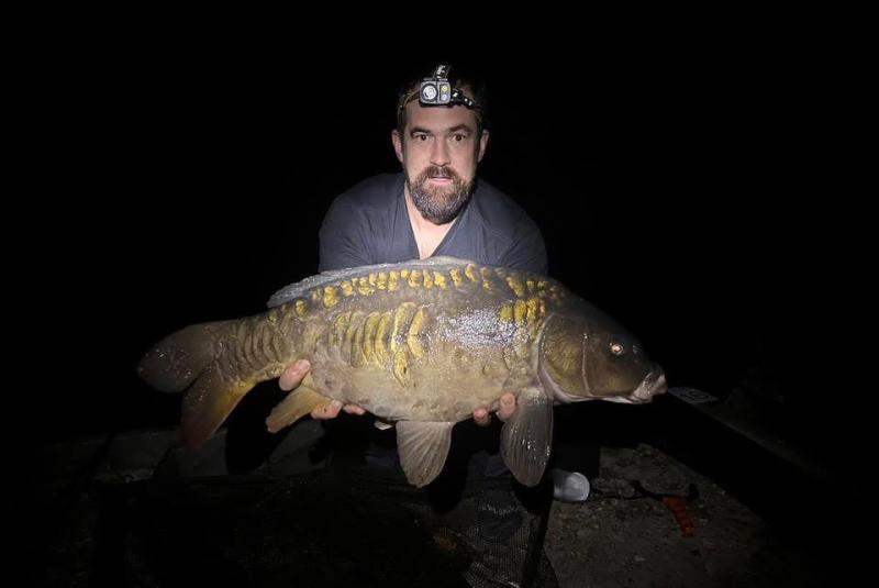 Tom Stebbens with a Mirror Carp