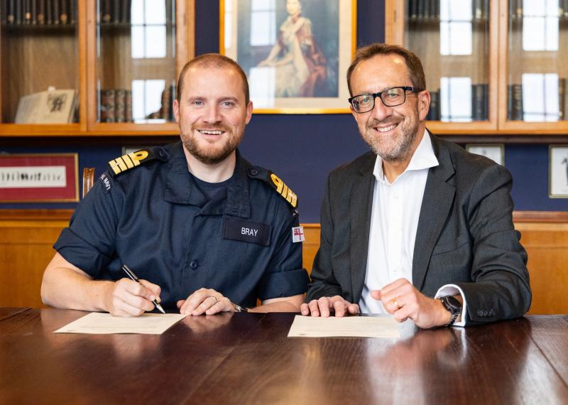 College principal Laurence Frewin and BRNC's Capt Andrew Bray sign the agreement