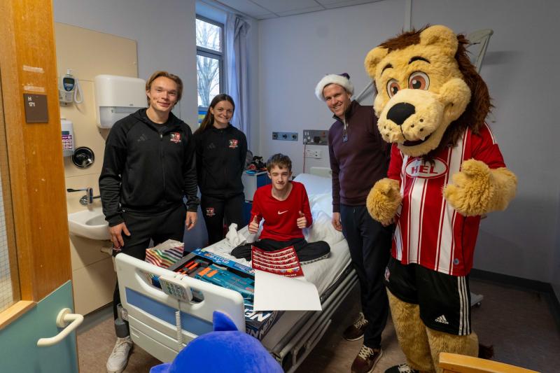 Exeter City FC players bring Christmas cheer to young patients at Royal Devon Hospital