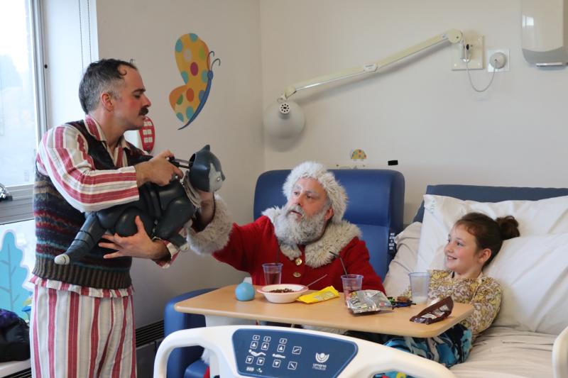 Puppeteer Christopher Finn and Father Christmas helped spread joy to children in Derriford this Christmas (Image- Theatre Royal)