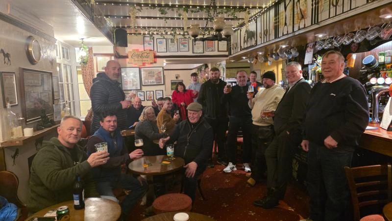 A group photo of patrons of the Horse and Groom in Bittaford on Tuesday evening (Image- Dawn-Marie Michelin)