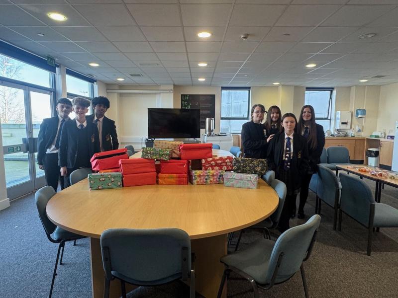 Exeter school community donates shoeboxes to support people experiencing homelessness
