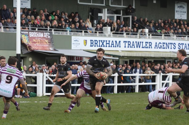 Packed stands at Astley Park for Devon Final