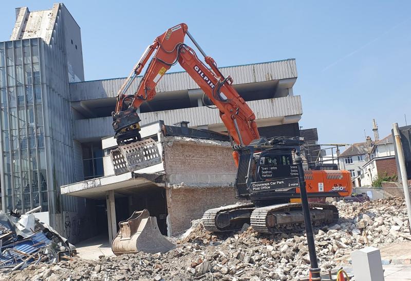 Diggers move in as full-scale demolition begins at Crossways Paignton