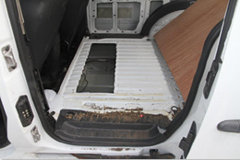 A drugs compartment in a van stopped by ;police