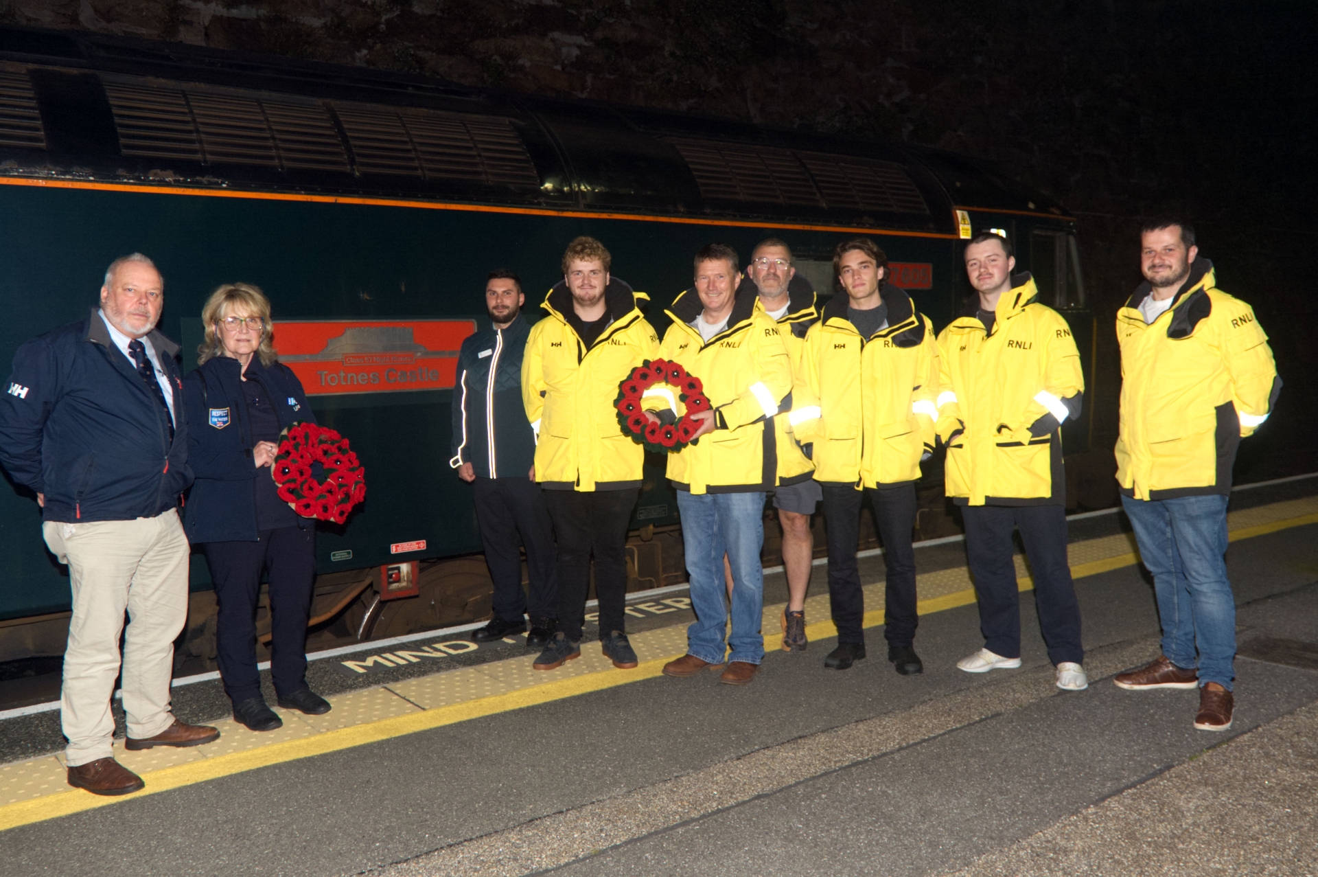 Night Riviera Sleeper train Totnes Castle with Dave Nicol RNLI (left), Gaynor Williams RNLI volunteer, Joe Lorusso Sleeper Lounge Host, Penlee Lifeboat crew Picture from Phil Monckton