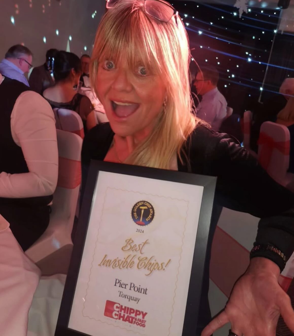 Lorraine Arnold with the Invisble Chips charity award