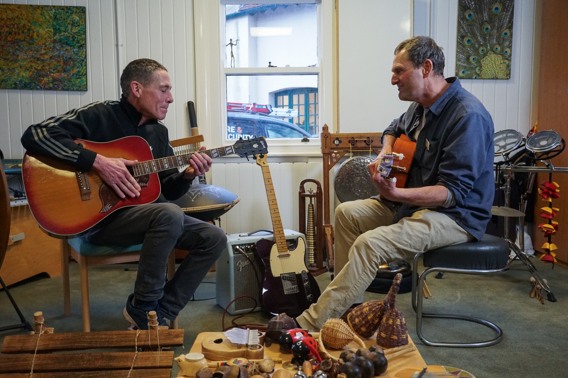 Nick Brixton (left) and Rowcroft's Music Therapist David Holmes (right)