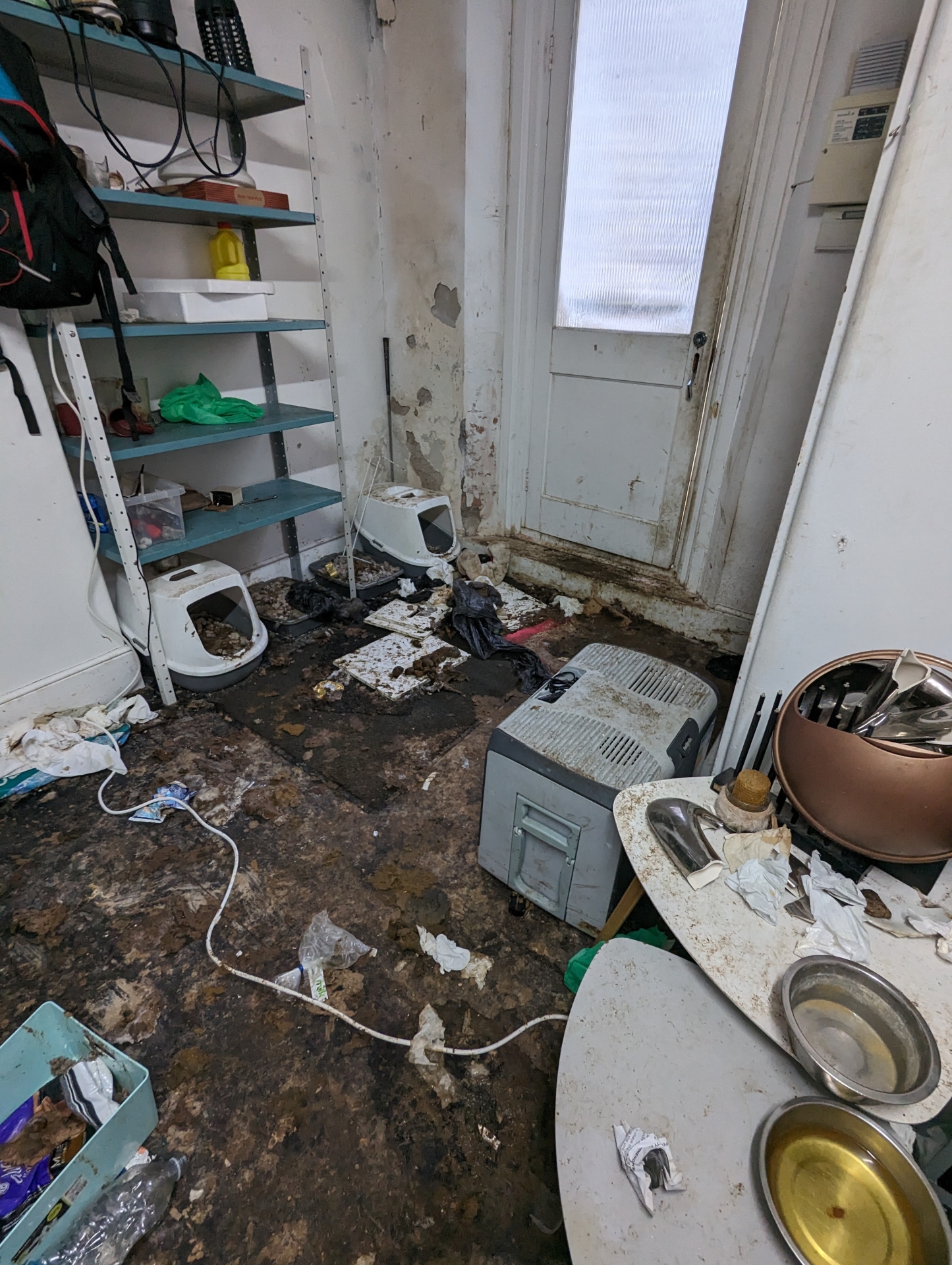 Entrance to the filthy flat