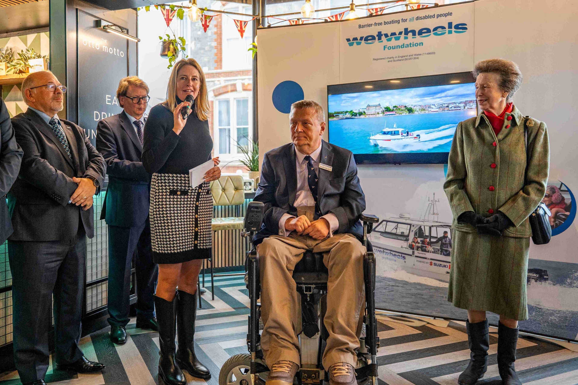 Michelle Brown thanks volunteers and guests with Princess Anne and Wetwheels founder Geoff Holt at the Ottos reception