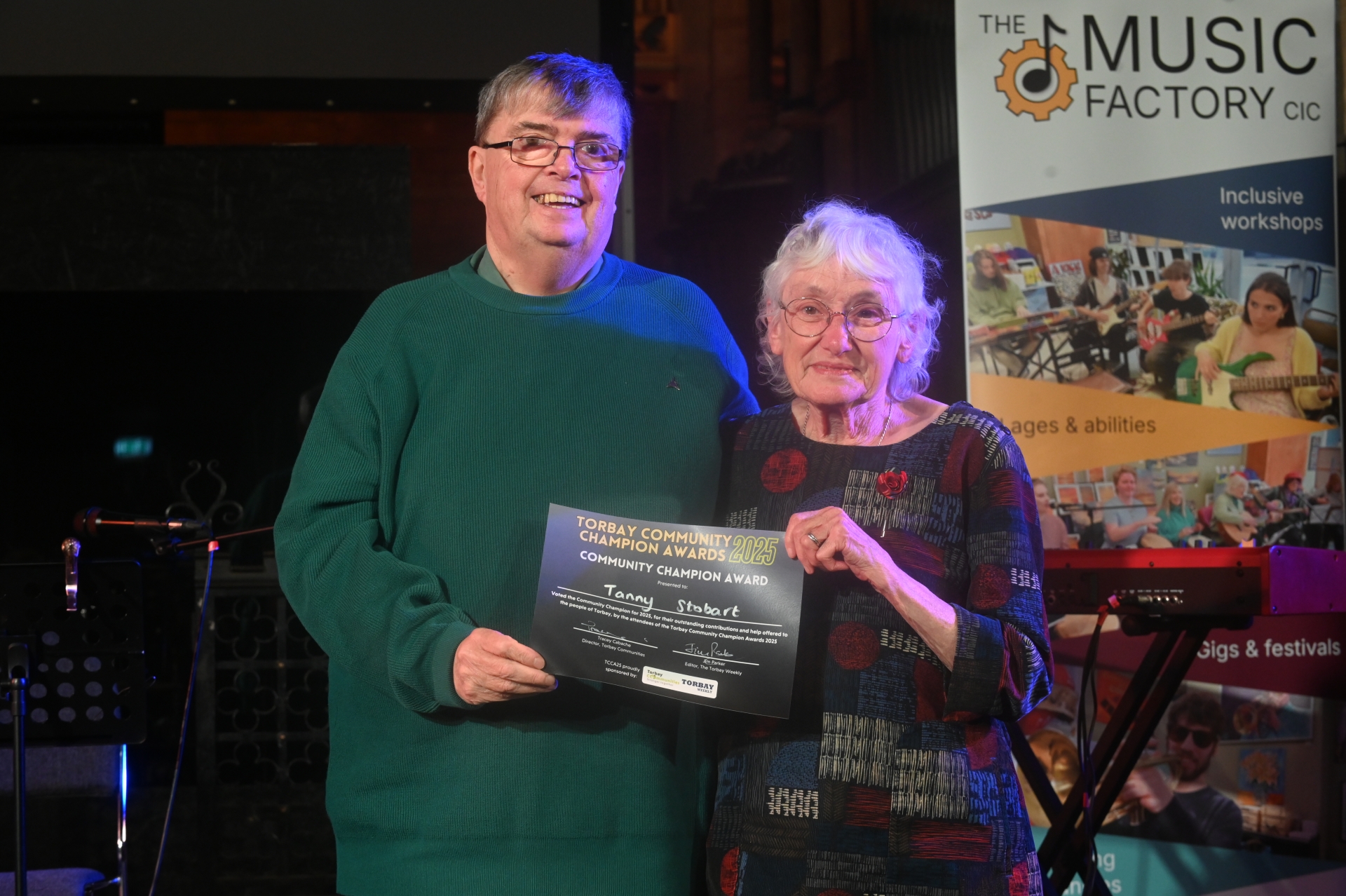 Overall Torbay Community Champion 2025 Tanny Stobart with last year's winner Norman 'Norrms' McNamara Pic miraclePR.com