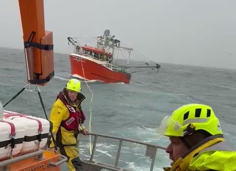 Trawler rescue - Torbay RNLI's crew make final checks before beginning the tow Pic Torbay RNLI