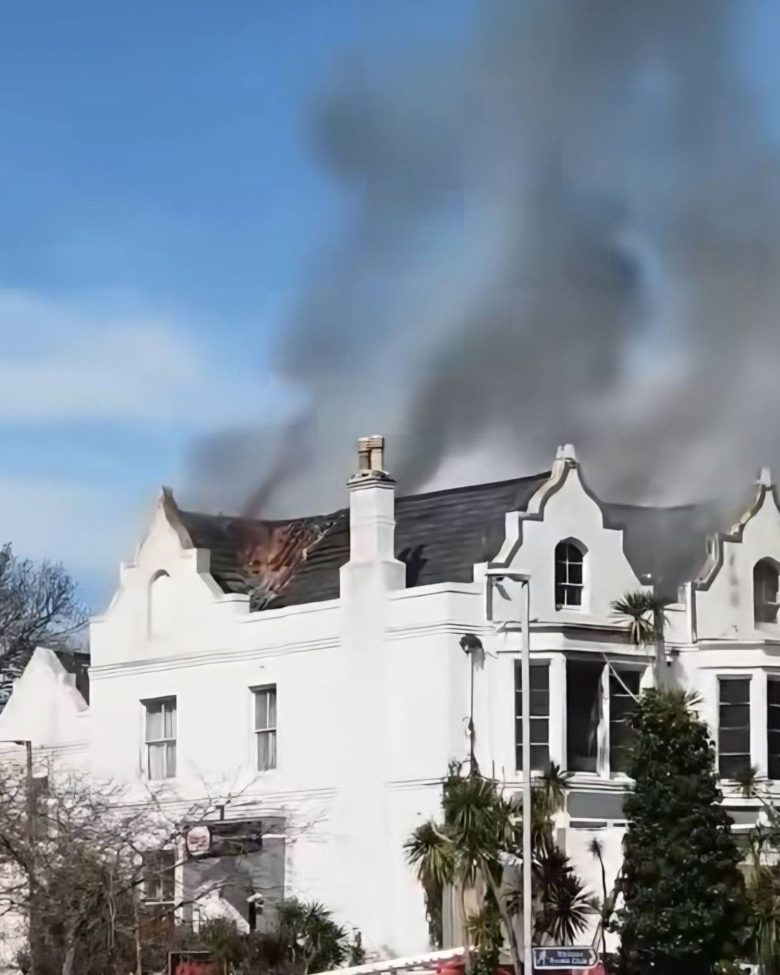 Sherwood Hotel blaze - flames shoot through the roof