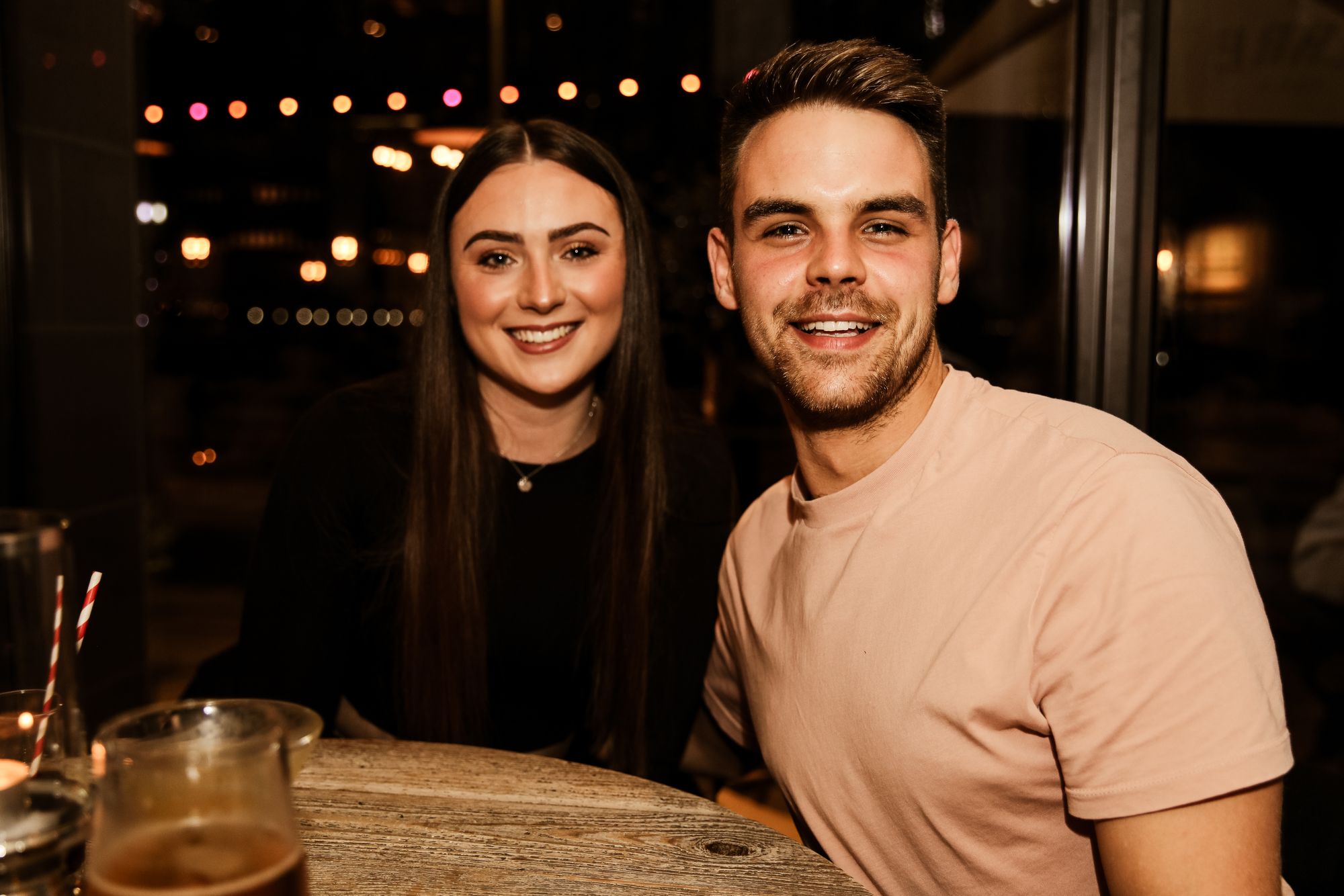 man and woman smiling for photo
