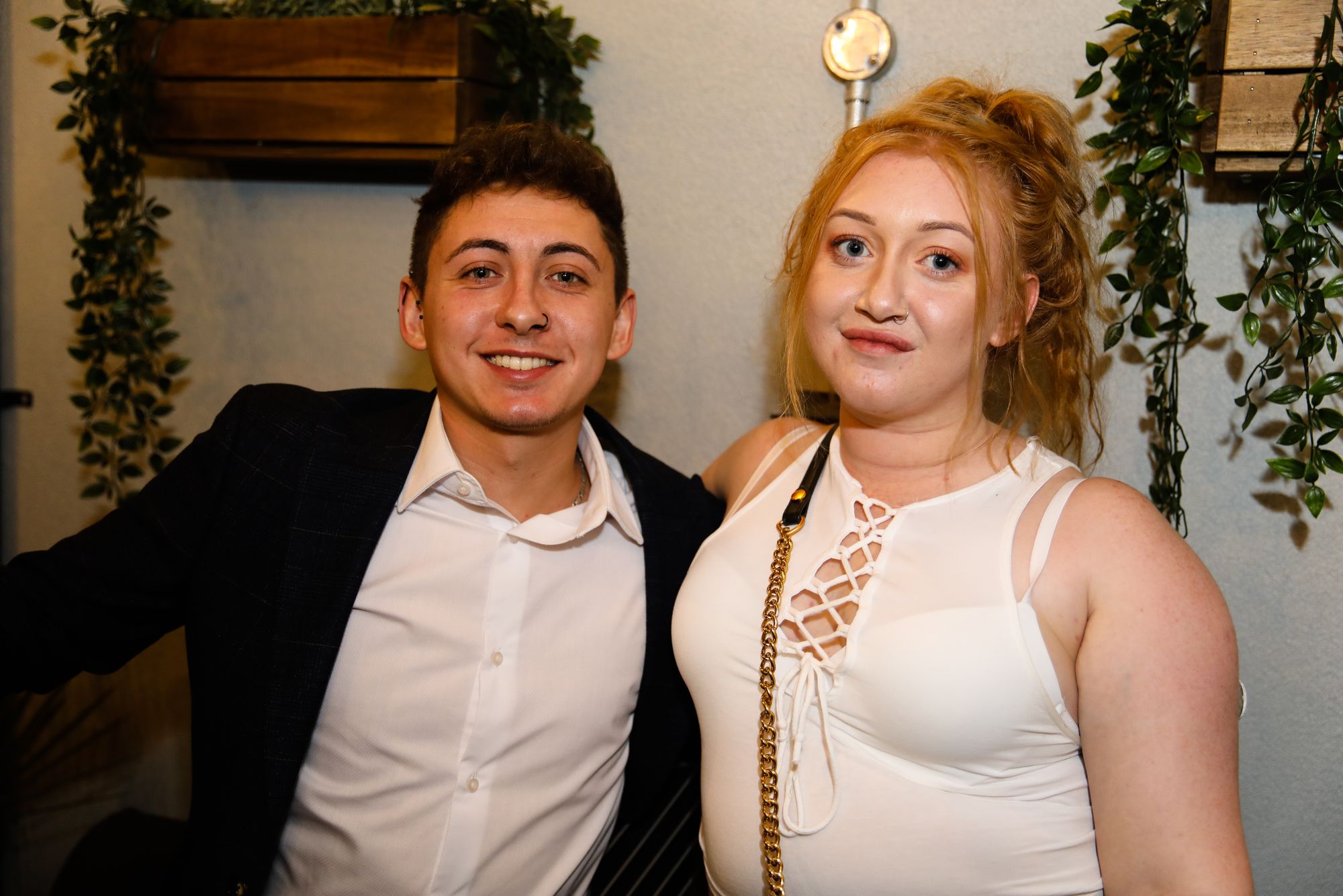 Man and woman posing for the camera
