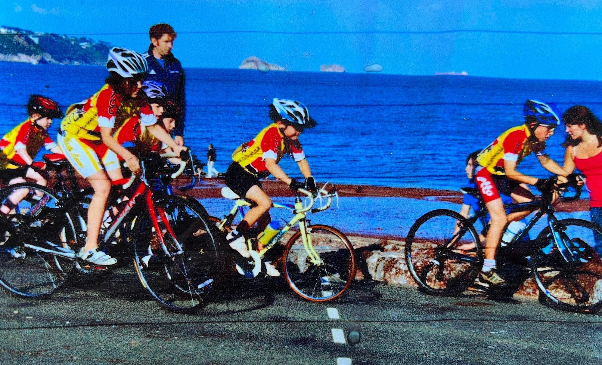  A ten-year-old Harrison Wood (right) leads the pack in a Paignton Regatta Junior Road Race on the seafront in 2010.