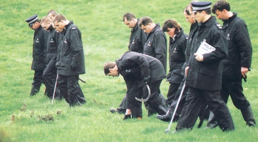 Police during the ground search in 1997