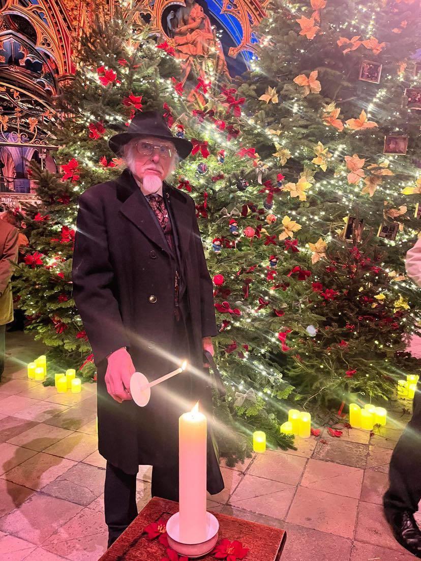 Lionel lights a candle for late wife Yvonne