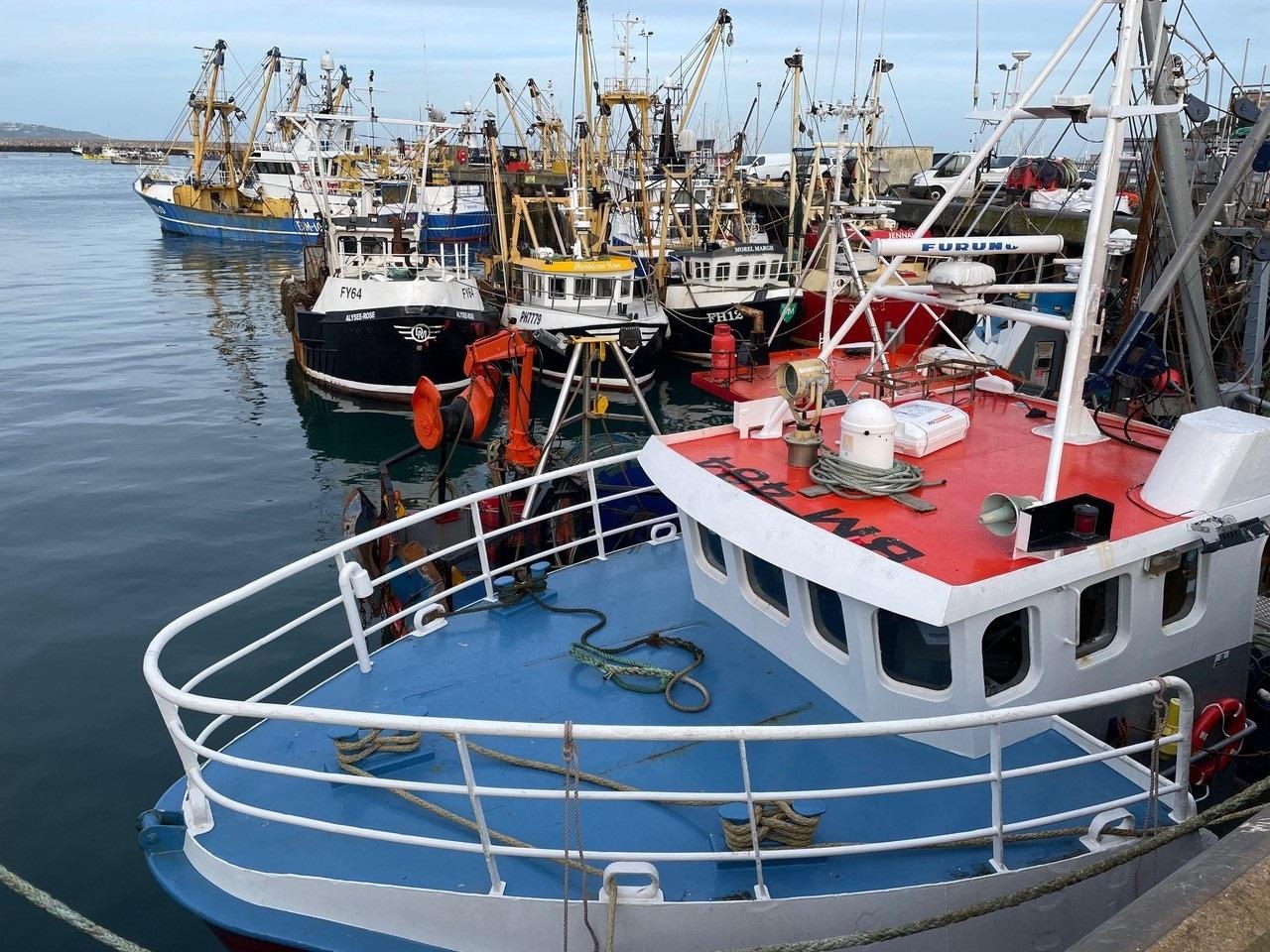Brixham's fishing fleet in the harbour ahead of a forecast weekend of bad weather. Credit: Stephen Coombes