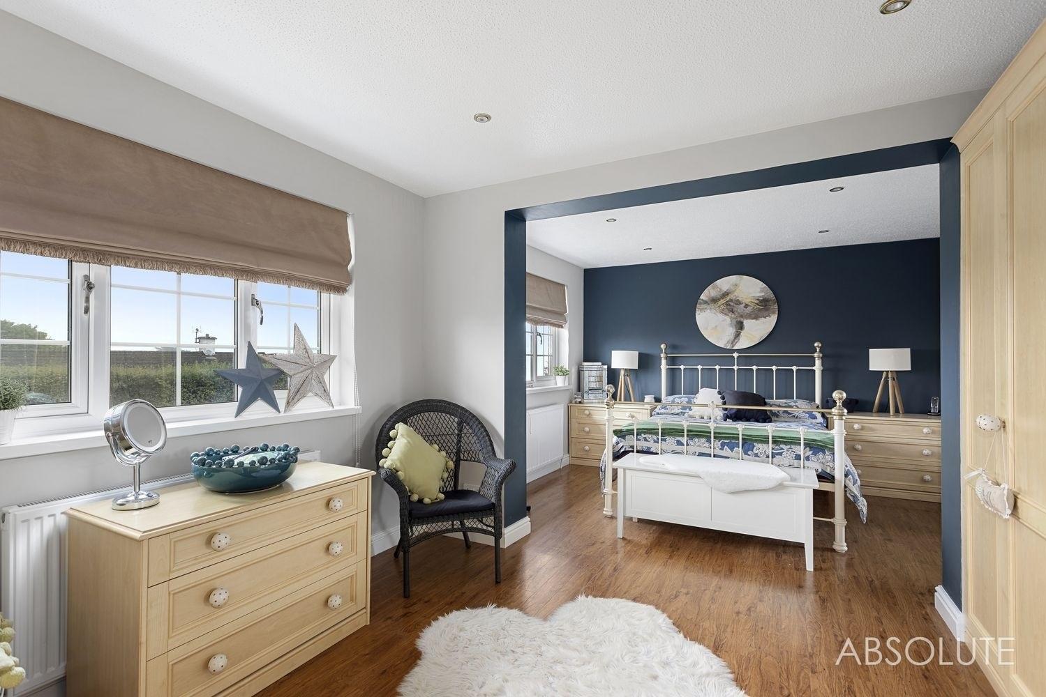 The master bedroom has an en-suite shower room, dressing area and sea views. Credit: Absolute Sales and Lettings