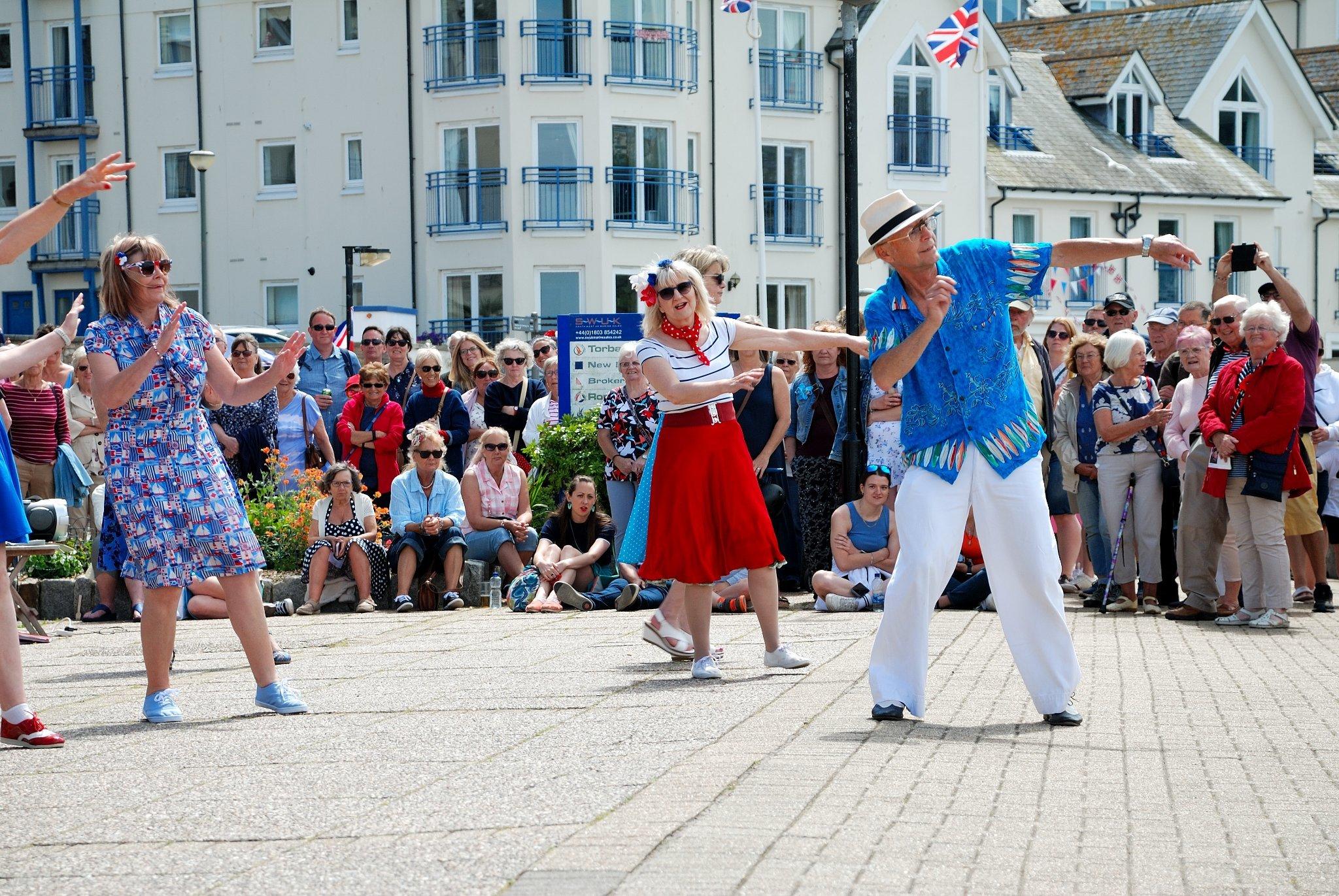 Celebrating the late Queen's Platinum Jubilee earlier this year with 1950s' dancing in Brixham. Credit: Dave Barratt
