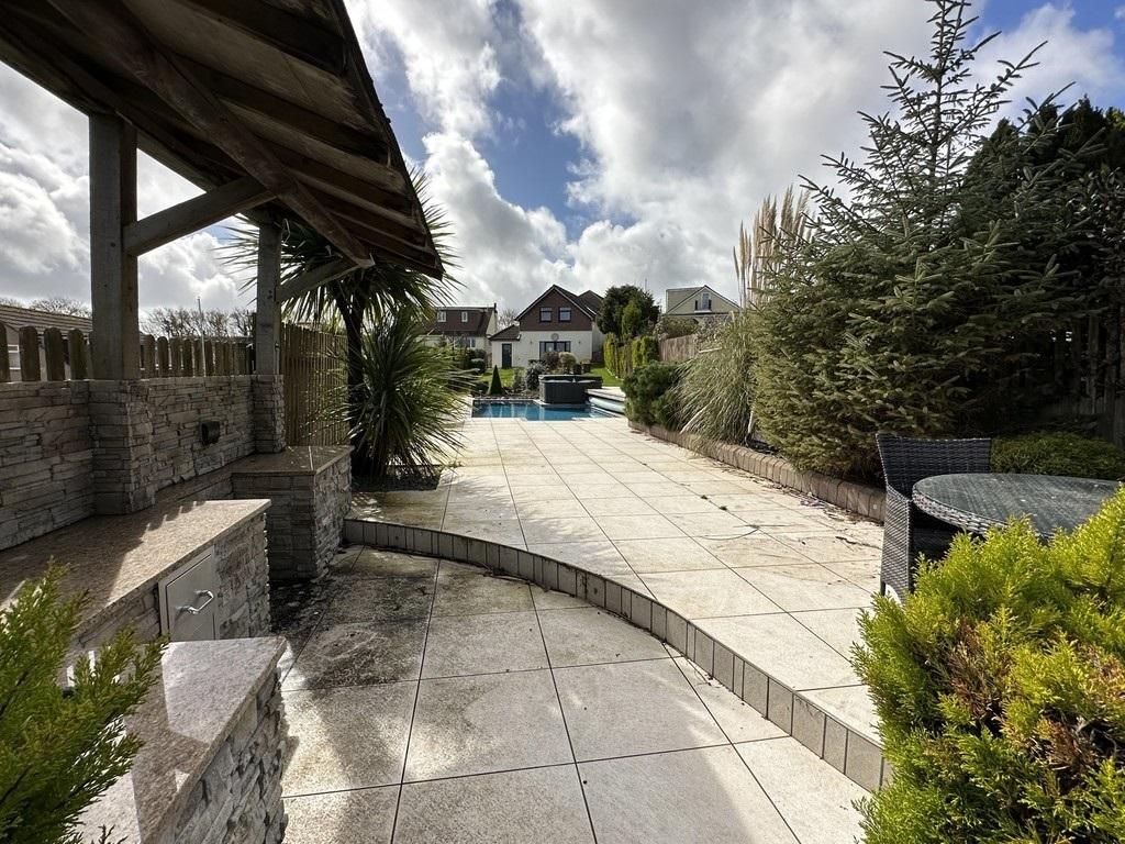 The Chelston property also features an outdoor kitchen. Credit: John Lake estate agents